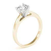 Elora yellow gold solitaire ring, side profile showing the white gold claw head against the warm band
