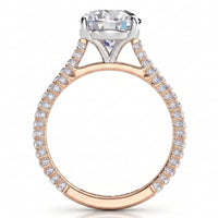 Elsie engagement ring in rose gold. Close view of the pave-set diamonds along the band.