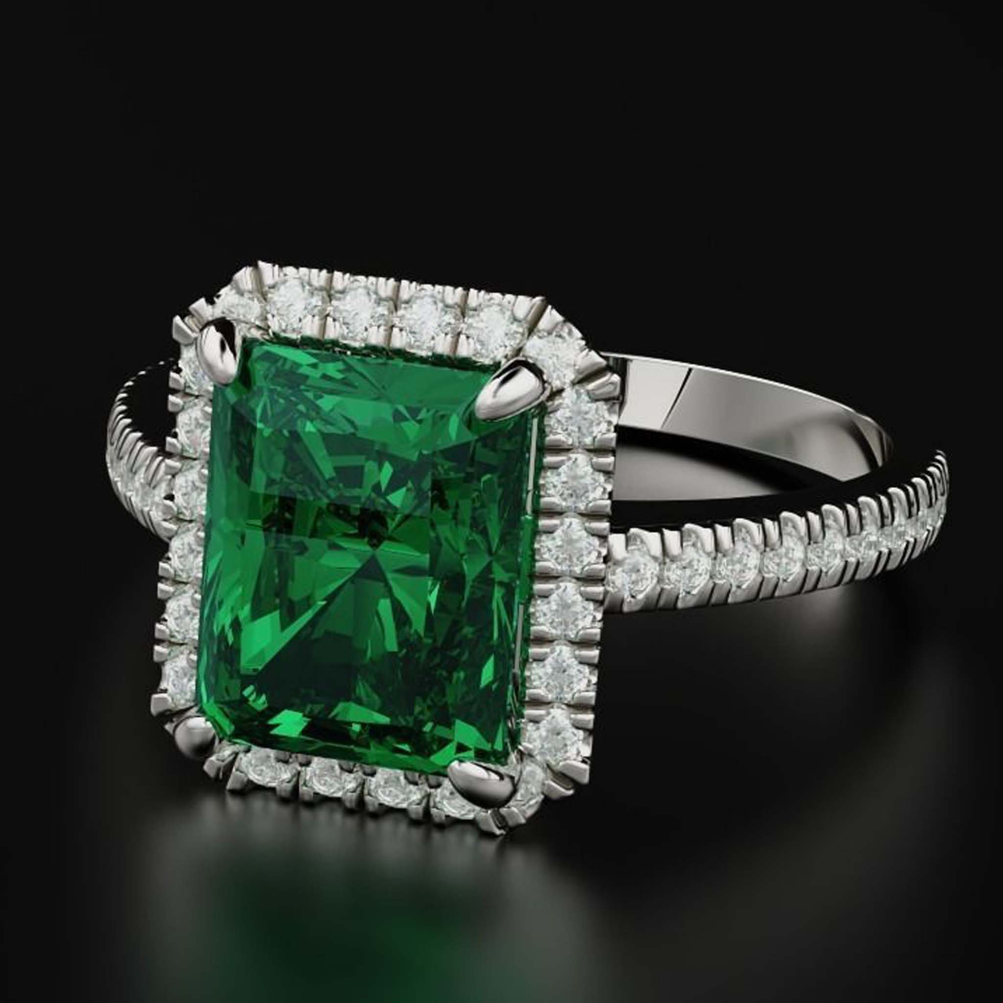Emerald and sapphire engagement rings - view our stunning collection here