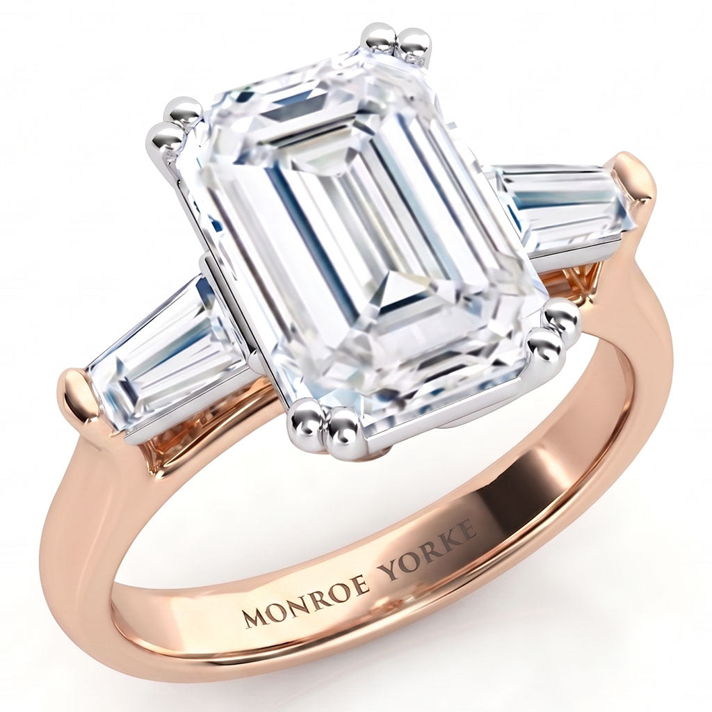 Envy - emerald centre and tapered baguette  cut three diamond ring, Trilogy ring. Rose Gold