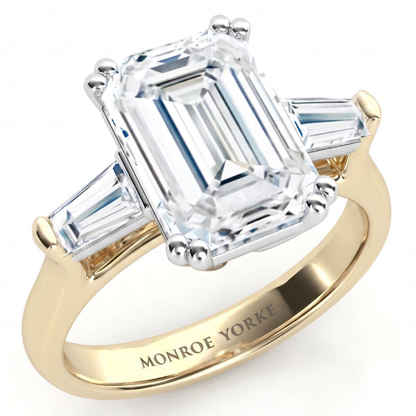 Envy emerald centre and tapered baguette  cut three diamond ring, Trilogy ring. yellow gold. 