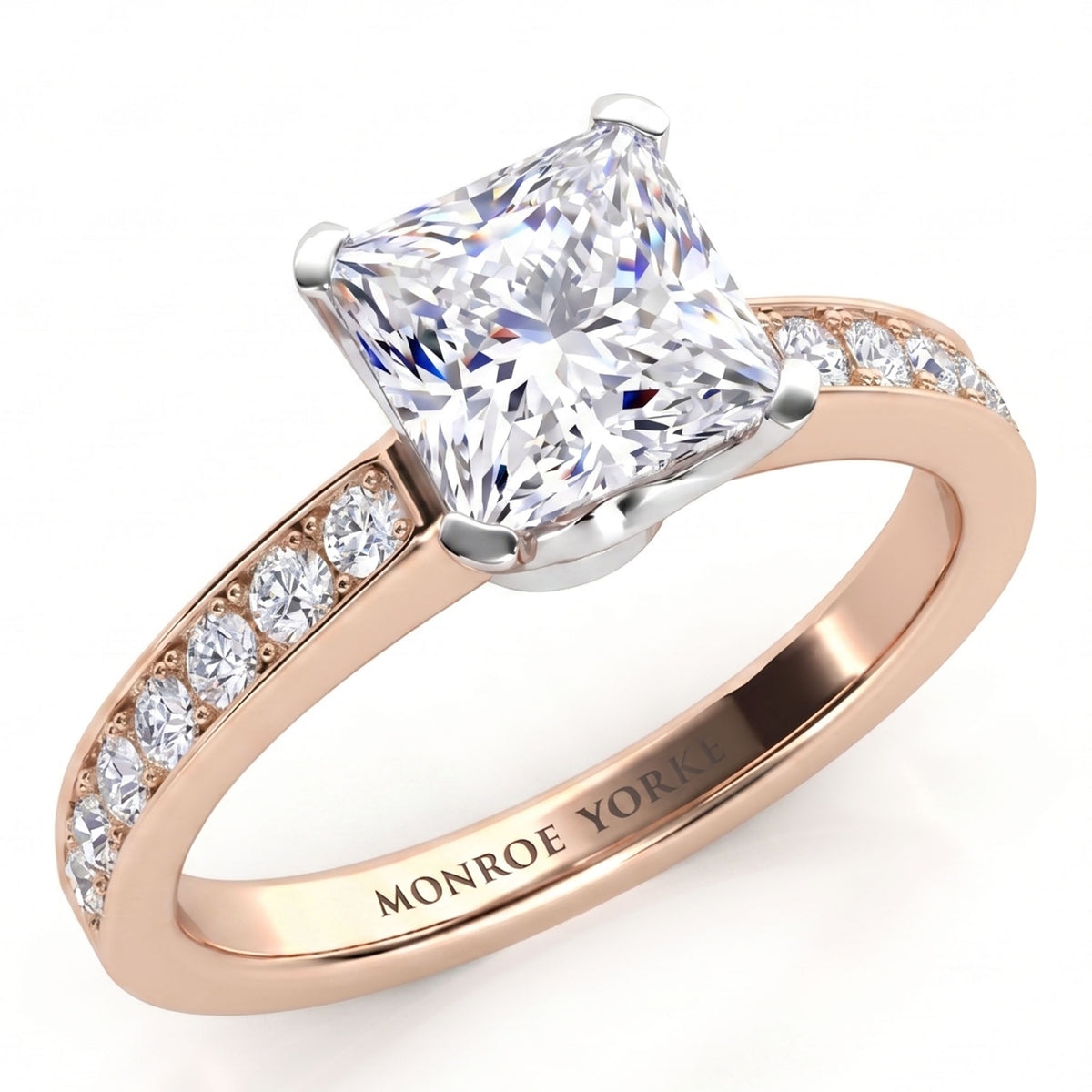 Fifth Avenue rose gold engagement ring, princess cut centre diamond with micro claw set diamonds on the band.