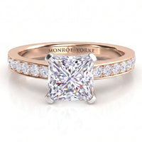 Fifth Avenue rose gold engagement ring, princess cut centre diamond above a diamond set band, Monroe Yorke engraved inside the band.