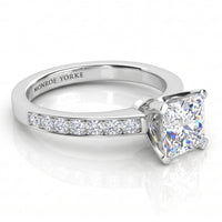 Fifth Avenue engagement ring in white gold or platinum, side view showing the micro claw set shoulder diamonds.