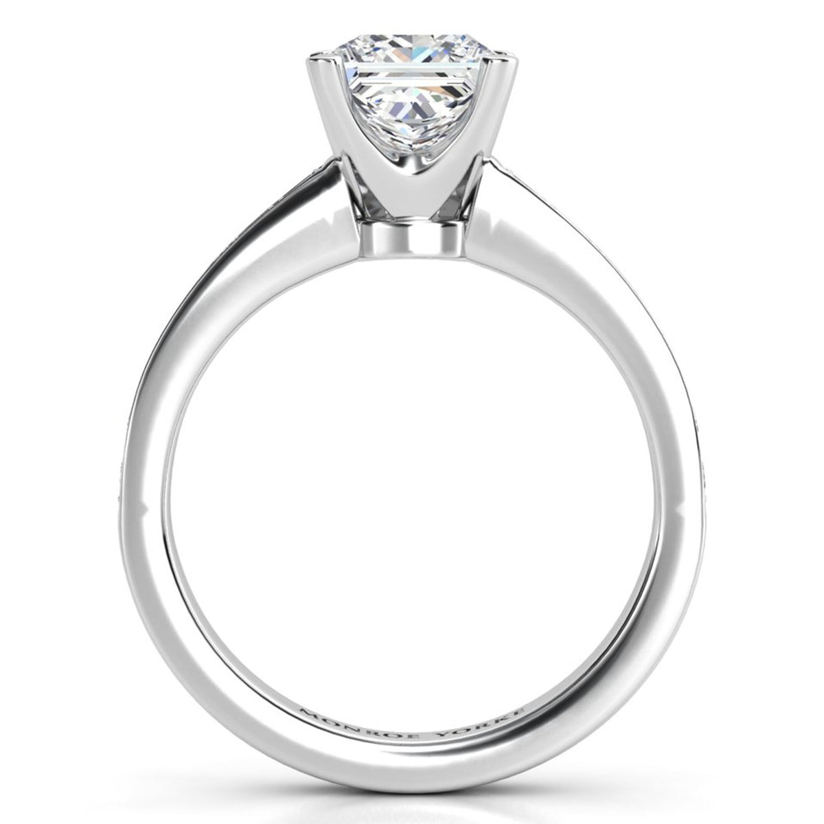 Fifth Avenue engagement ring in white gold or platinum, close side view of the centre setting and the band.