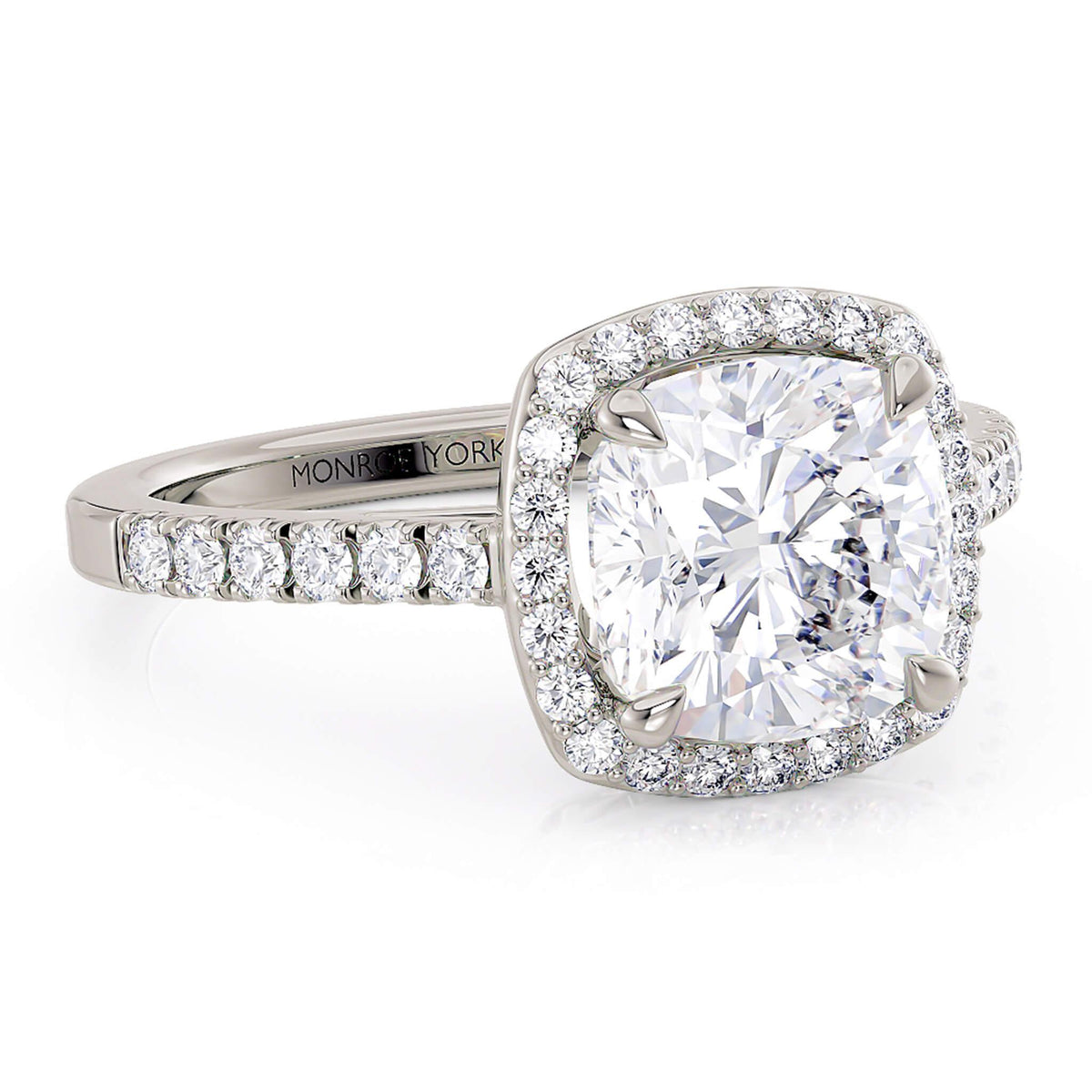 Frankie in 18ct white gold, halo of diamonds around the cushion cut centre
