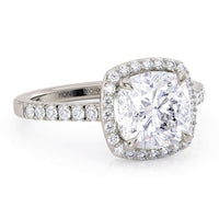 Frankie in 18ct white gold, halo of diamonds around the cushion cut centre