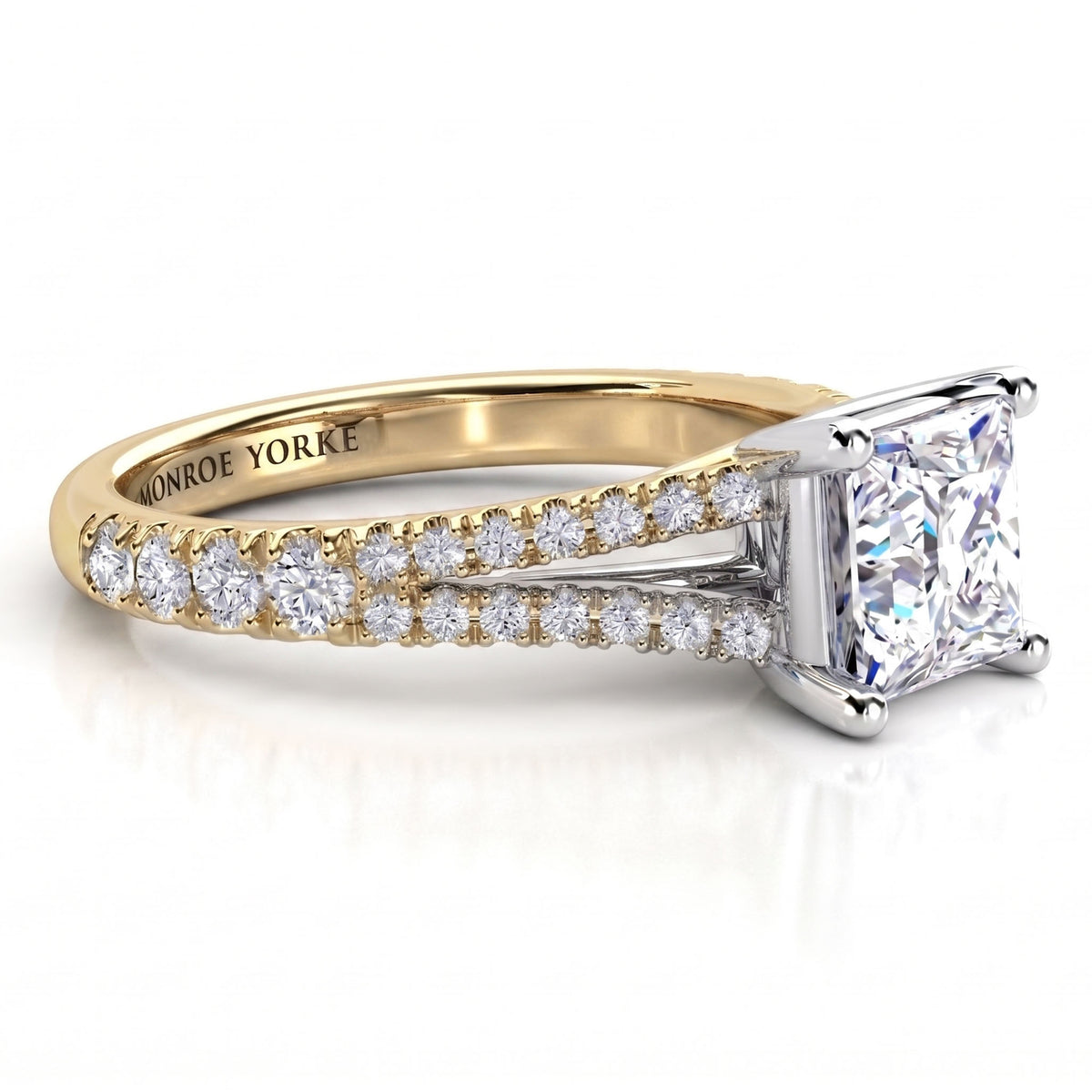 Gemma - a two-tone diamond engagement ring with a princess-cut centre stone, featuring a yellow gold split band with pavé diamonds 
