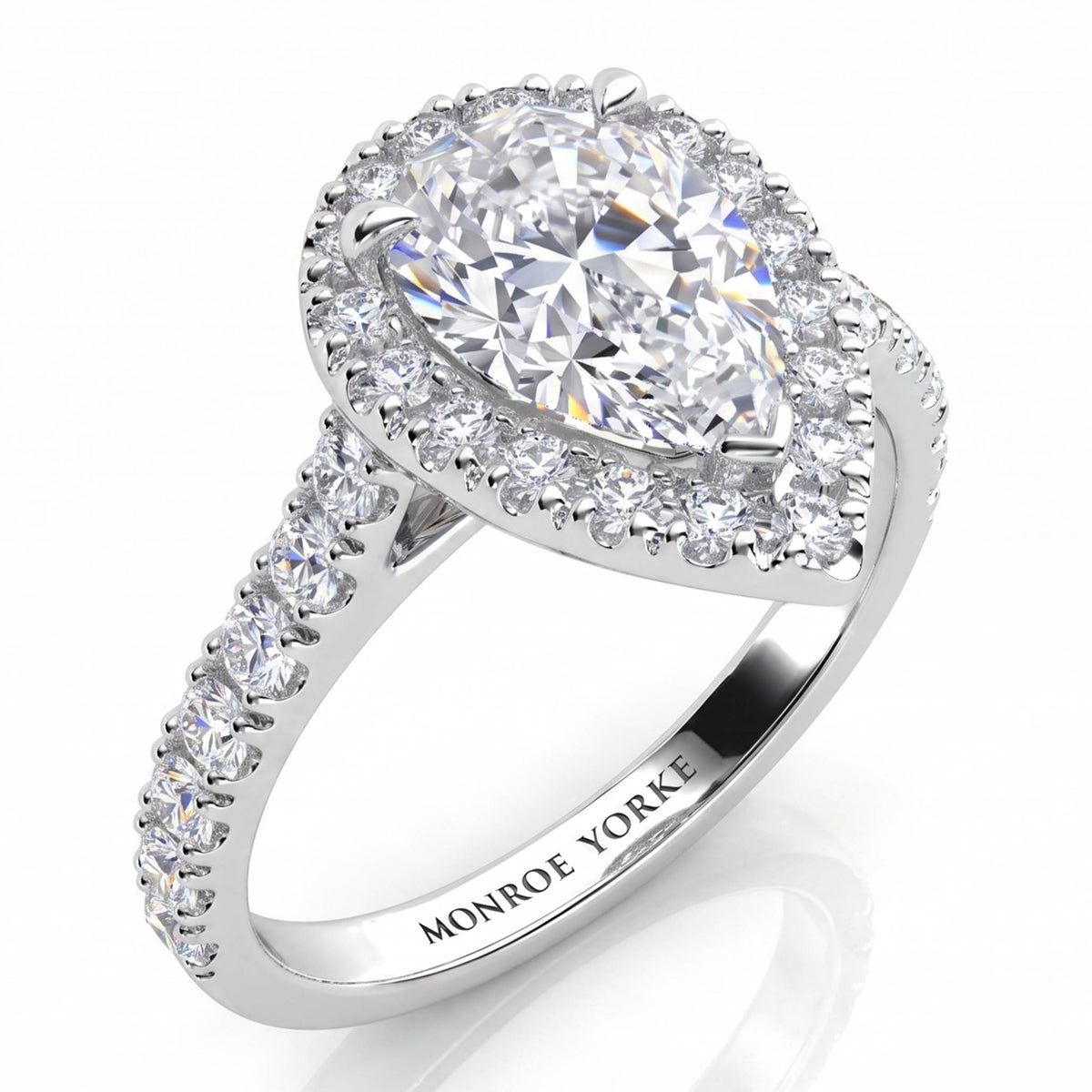 Iris - Platinum or white gold GIA certified pear cut diamond halo engagement ring with diamonds on the sweep up band. 