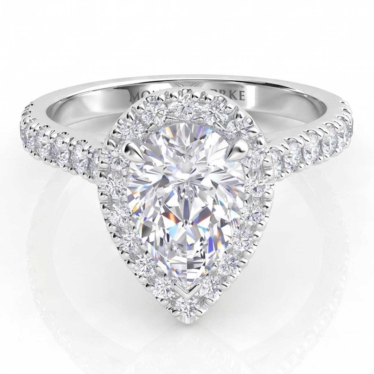 Iris - Platinum GIA certified pear cut diamond halo engagement ring with diamonds on the sweep up band. Centre diamond one V-clw and 2 normal claws. Front View. Also available in White Gold