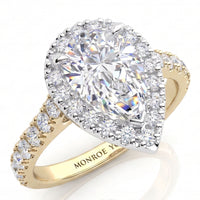 Iris - GIA certified pear cut diamond halo engagement ring with diamonds on the sweep up band. Yellow gold