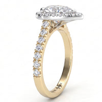 Iris - yellow gold GIA certified pear cut diamond halo engagement ring with diamonds on the sweep up band.  Side view