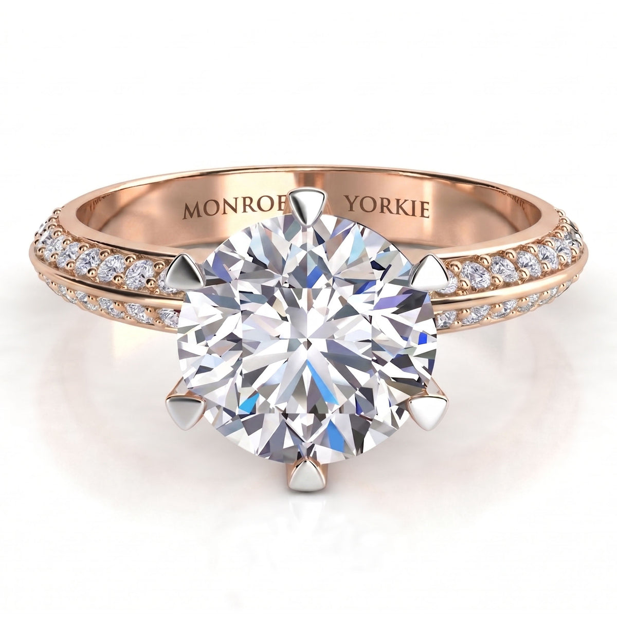 Juliet engagement ring in rose gold, MONROE YORKE engraved inside the band, with pave-set accent diamonds along the shank.