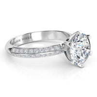 Juliet engagement ring in platinum or white gold. Side view showing the six claw setting and the pave-set band.