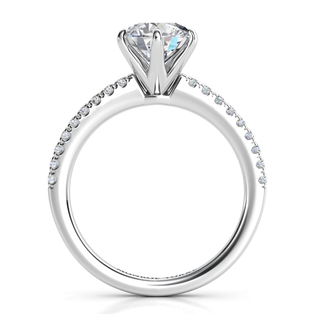Diamond ring engagement ring with a round diamond in a six claw setting.  White gold or platinum