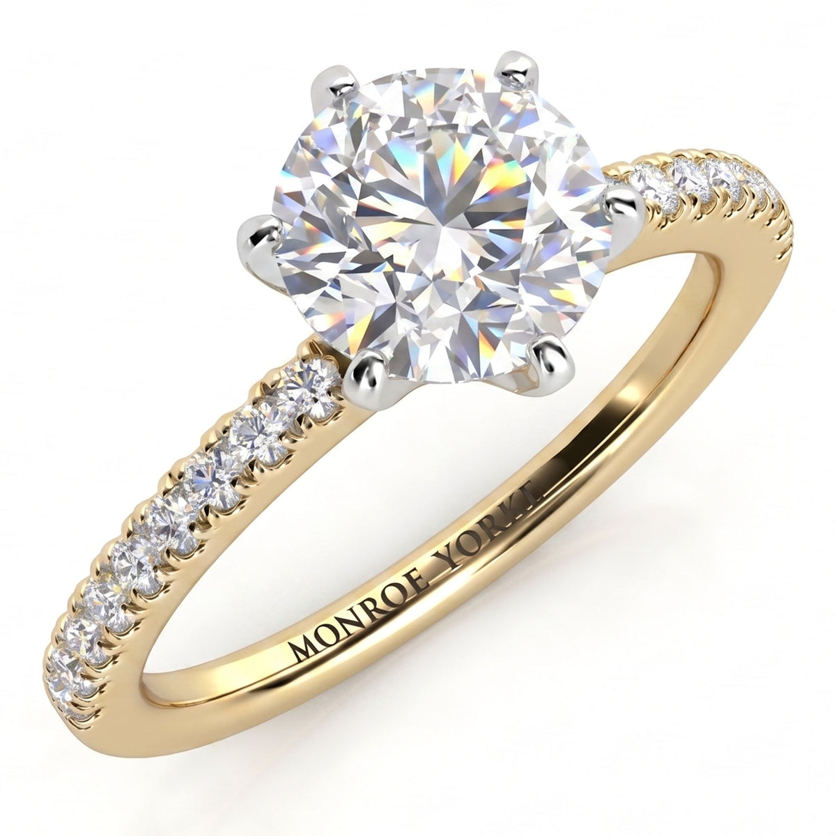 June - Yellow gold, six claw centre setting with diamonds on the band. Centre GIA certified round diamond.