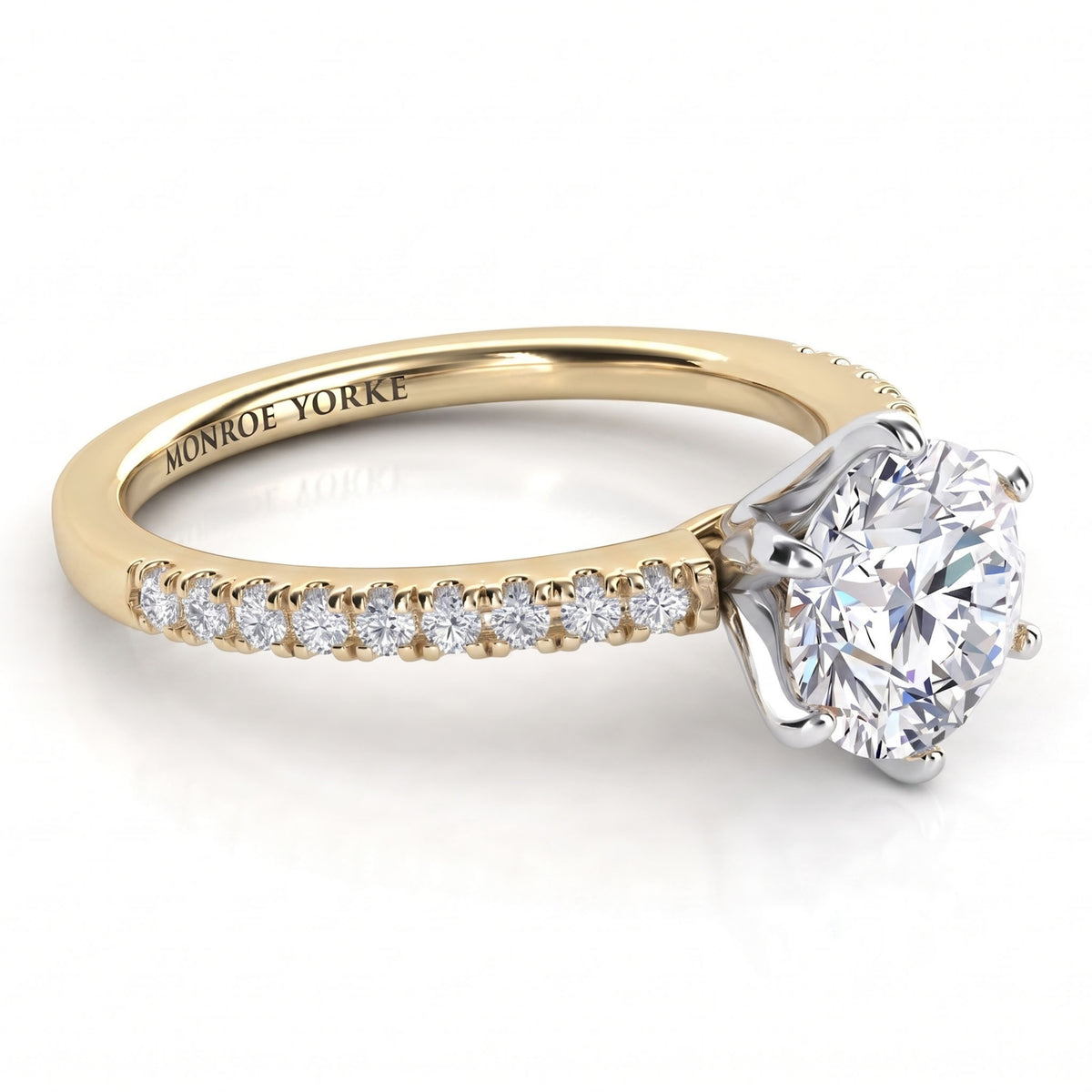 June - Yellow gold diamond engagement ring with side diamonds. Centre six claw setting.