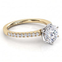 June - Yellow gold diamond engagement ring with side diamonds. Centre six claw setting.