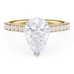 Karly pear cut diamond engagement ring in gold with diamonds on the band
