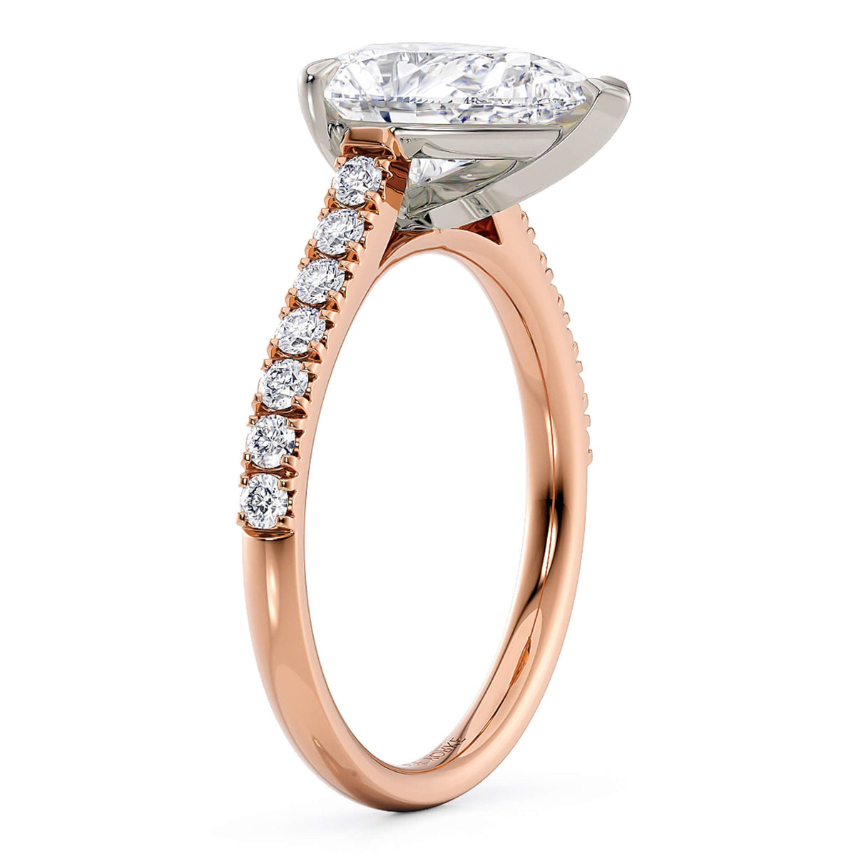 Karly in rose gold, side view of the cathedral setting