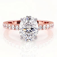 Kendall - Rose gold engagement ring featuring a large oval center diamond and a pavé-set diamond band.