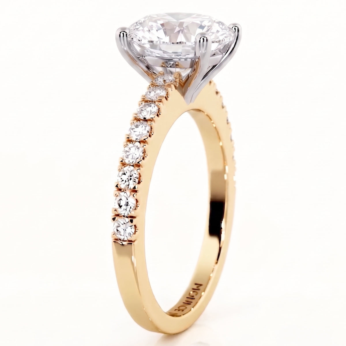 Side view of the Kendall Yellow Gold, oval cut diamond engagement ring