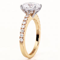 Side view of the Kendall Yellow Gold, oval cut diamond engagement ring