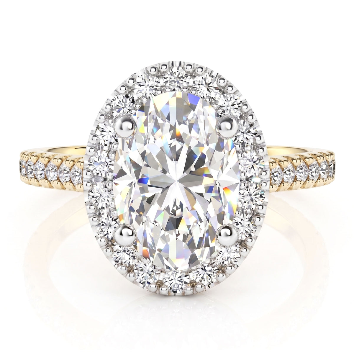 An oval halo ring featuring a large oval-cut center stone surrounded by a halo of smaller stones, set on a yellow gold band with pavé accents.