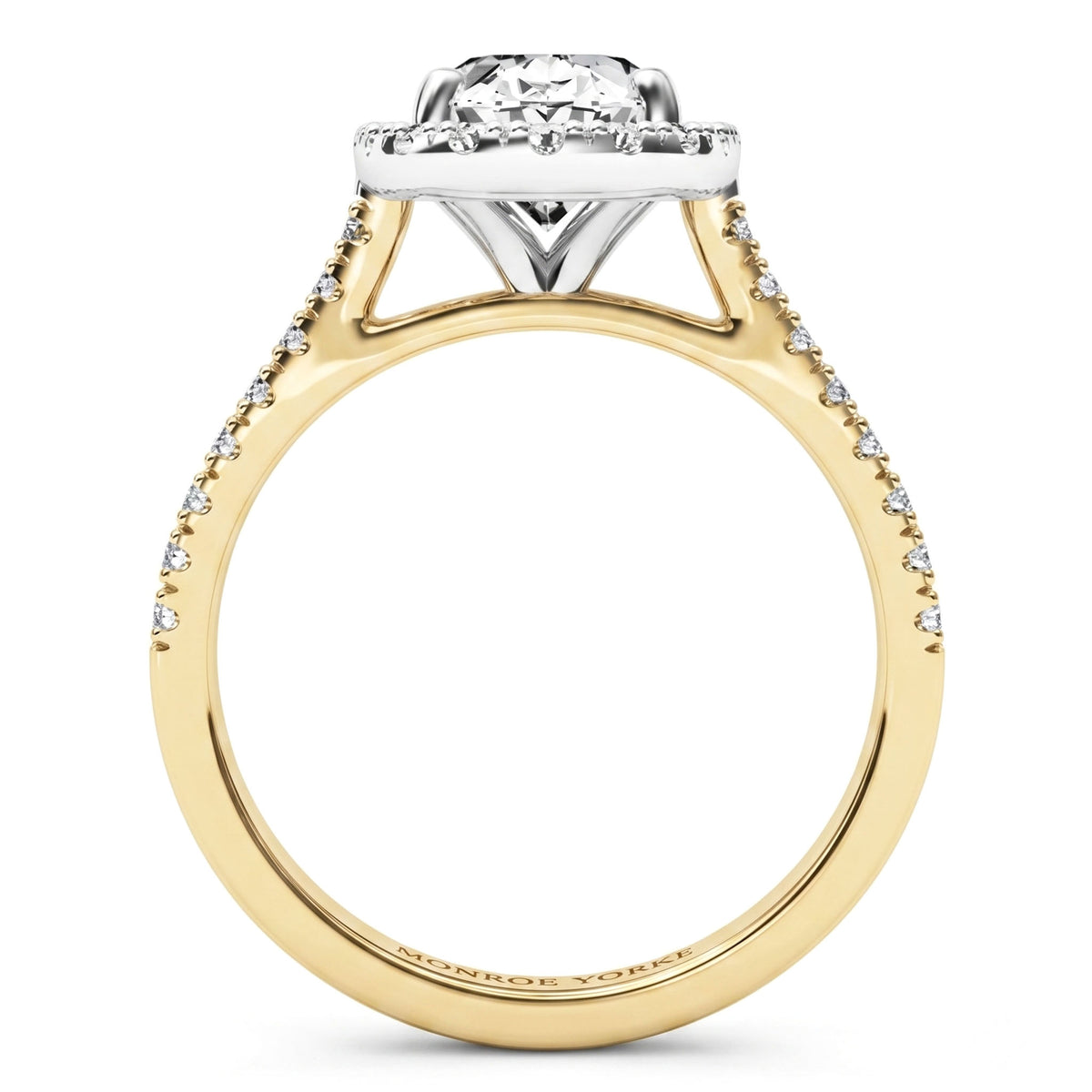 A yellow gold engagement ring featuring a round-cut diamond center stone and a halo of smaller diamonds, with additional pavé diamonds along the shank