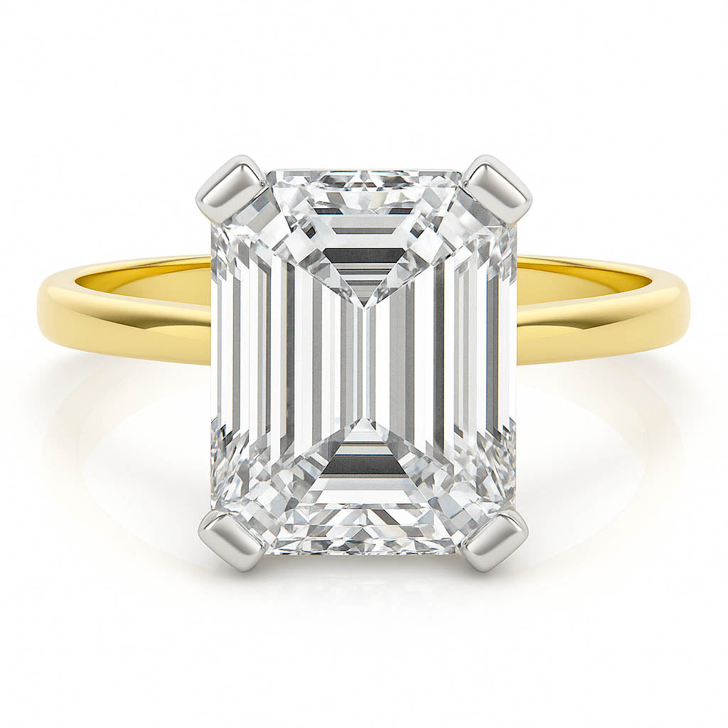 4 carat emerald cut diamond ring. Band in yellow gold