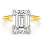4 carat emerald cut diamond ring. Band in yellow gold