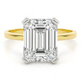4 carat emerald cut diamond ring. Band in yellow gold