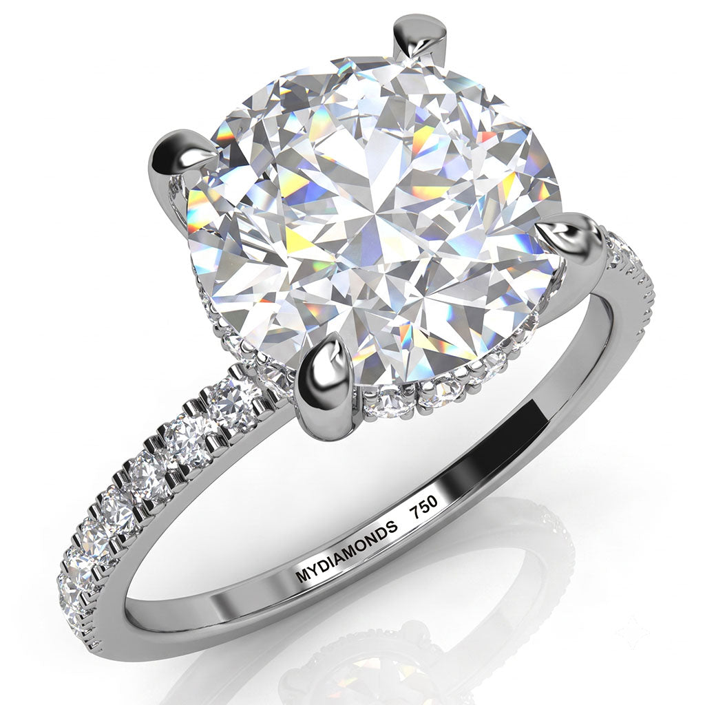 Liliana hidden halo diamond engagement ring in white gold or platinum, angled view