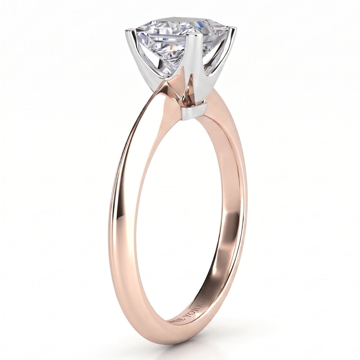 Louisa - a solitaire engagement ring featuring a princess cut diamond set in a four-prong white metal crown on a polished rose gold band, shown against a clean white background. Rose Gold