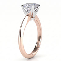 Louisa - a solitaire engagement ring featuring a princess cut diamond set in a four-prong white metal crown on a polished rose gold band, shown against a clean white background. Rose Gold