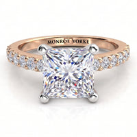 Lutèce rose gold engagement ring, front view of the princess cut centre diamond with a row of small round diamonds down each shoulder.