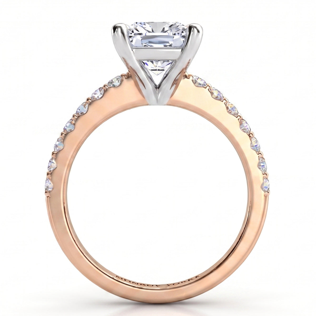 Lutèce rose gold engagement ring, front elevation of the princess cut centre diamond above a diamond set band.