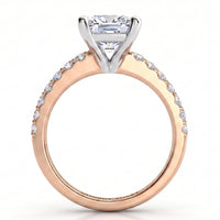 Lutèce rose gold engagement ring, front elevation of the princess cut centre diamond above a diamond set band.