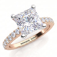 Lutèce rose gold engagement ring, angled view of the princess cut centre diamond in a four claw setting with micro claw set diamonds along the shoulders, Monroe Yorke engraved on the band.