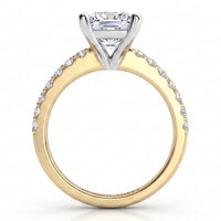 Lutèce yellow gold engagement ring, front elevation of the princess cut centre diamond above a diamond set band.