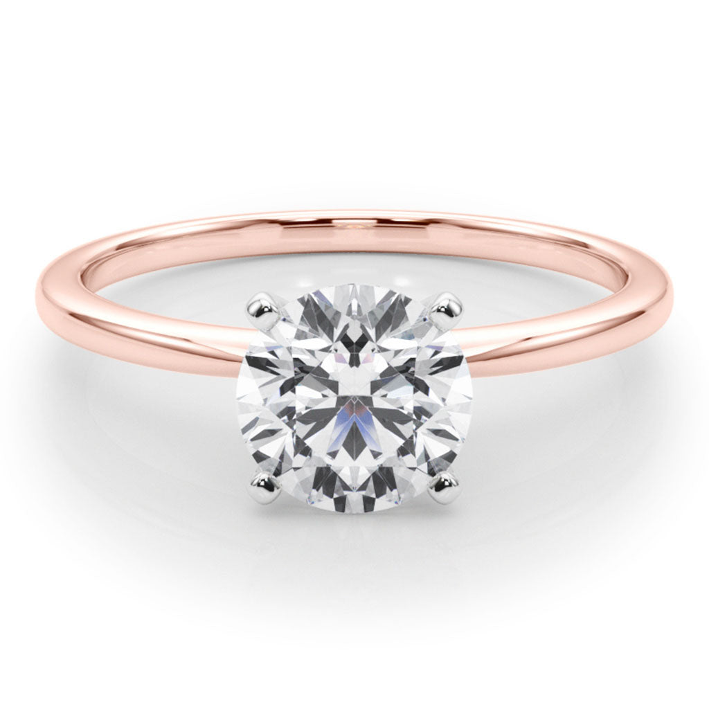 Maria solitaire setting in rose gold, front view showing the delicate rounded band