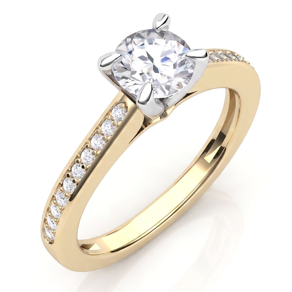 May - a yellow gold solitaire engagement ring with a round brilliant-cut diamond center stone and pavé-set round diamonds along the shank.