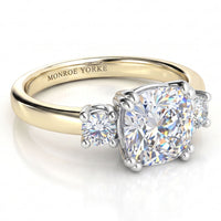 Meghan - Three diamond ring. Centre Cushion diamond and rounds on sides. Yellow Gold