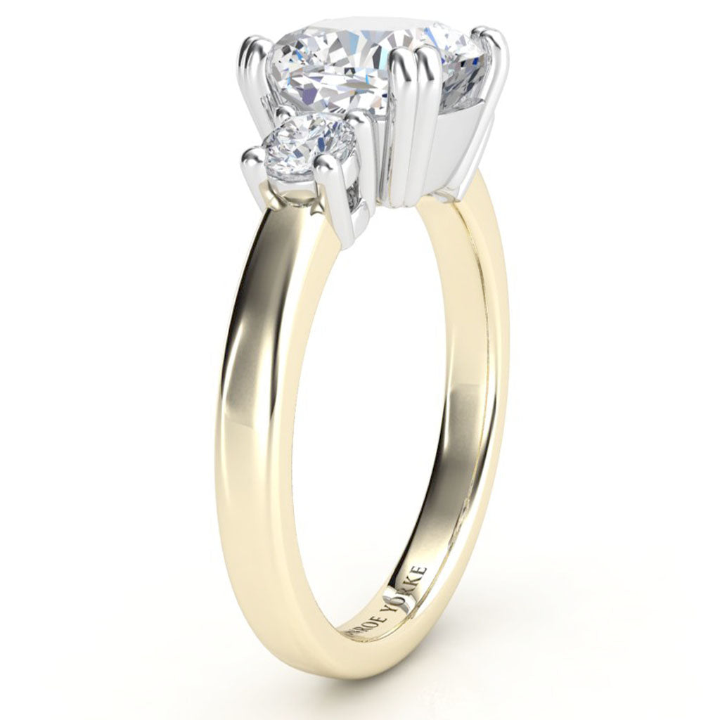 Meghan - Three diamond ring side view.  Yellow gold band