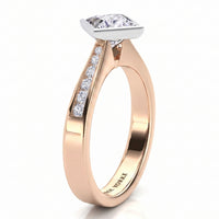 Nash - Rose gold princess cut diamond engagement ring, side view showing the channel set band.