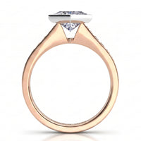 Nash - Rose gold princess cut diamond engagement ring, close side view of the centre setting.