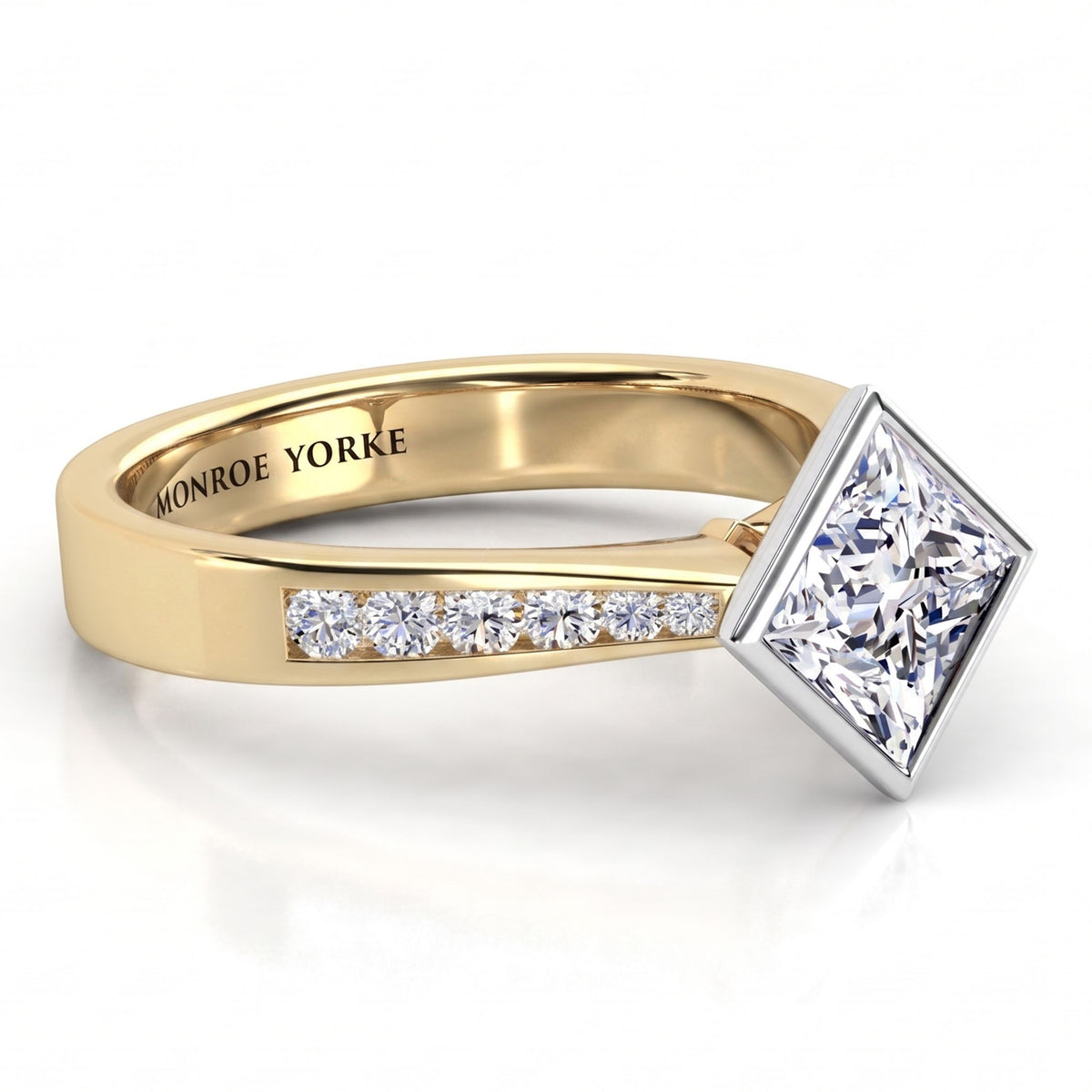Nash - Yellow gold princess cut diamond engagement ring, top view.