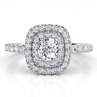 Norah double halo engagement ring in white gold or platinum, top view showing the cushion cut centre diamond ringed by an inner and outer halo of round brilliant diamonds.