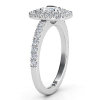 Norah double halo cushion cut ring in white gold or platinum, profile view showing the low set halo disk and the round diamonds claw set along the band.