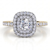 Norah double halo engagement ring with a yellow gold band, top view showing the cushion cut centre diamond ringed by an inner and outer halo of round brilliant diamonds.